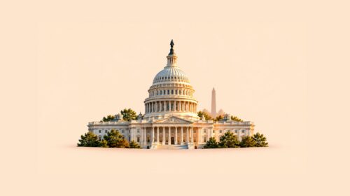 U.S. Capitol in Washington, D.C., with its dome and the Washington Monument visible in the distance, surrounded by trees at sunset.
